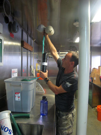 Dr. Carl Meyer works on his floats.