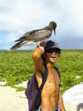 Fish and Wildlife Service contractor with Albatross.  Photo by Aulani Wilhelm.