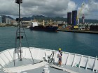 front deck with ropes and harbor in background