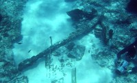 Large old anchor underwater